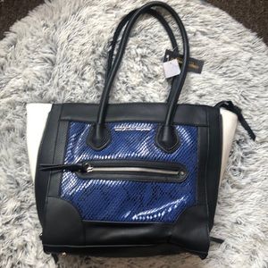 Blue, black, and white purse